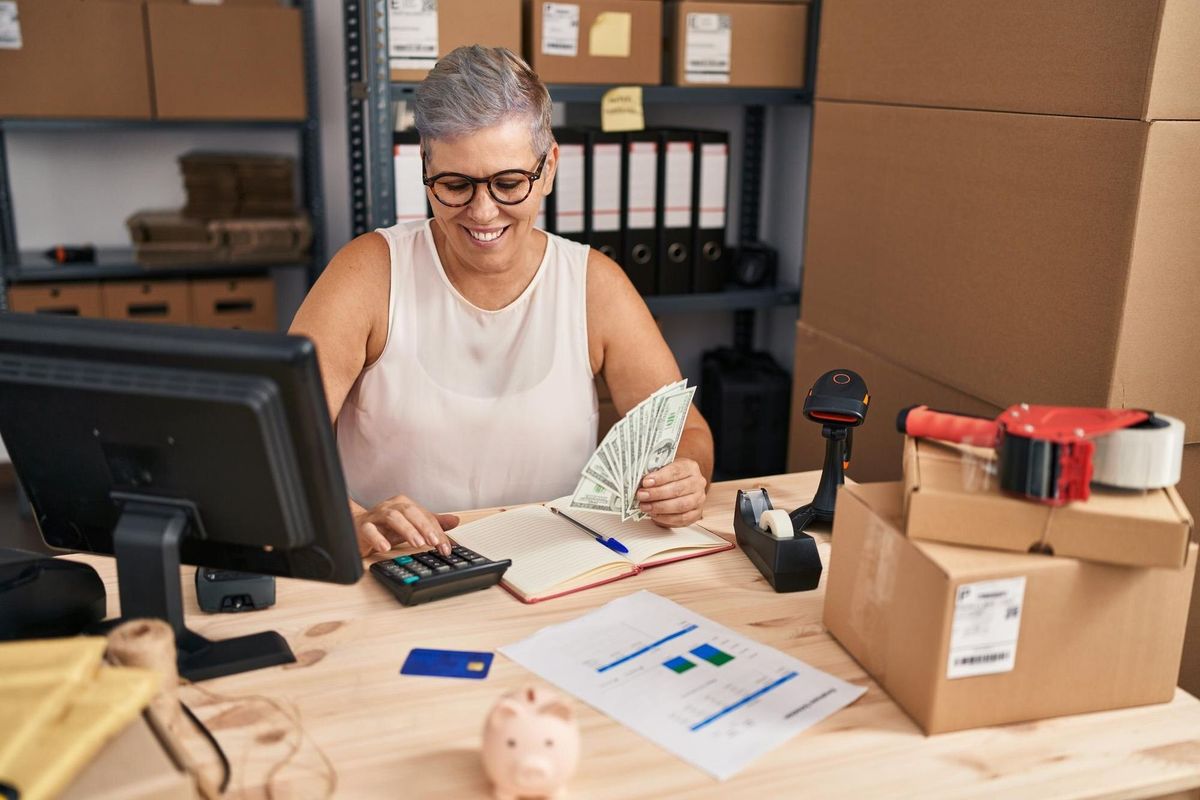 Middle age woman ecommerce business worker accounting economy at office